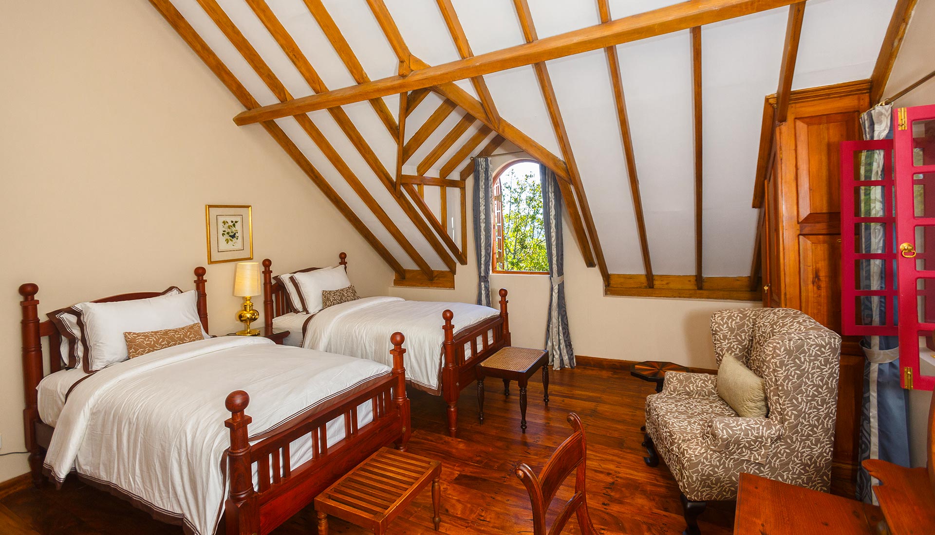 The Twin Room with 2 single beds under exposed roof beams